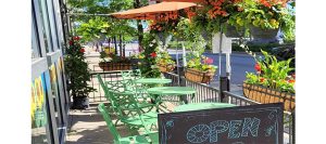 Sidewalk seating area at City News on Chicago's northwest side