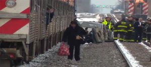 woman killed after car stuck by train on Chicago's northwest side