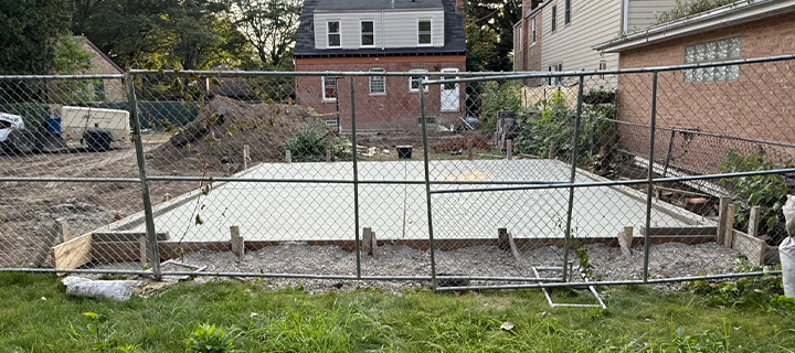 construction starts on permitted garage along unimproved alley